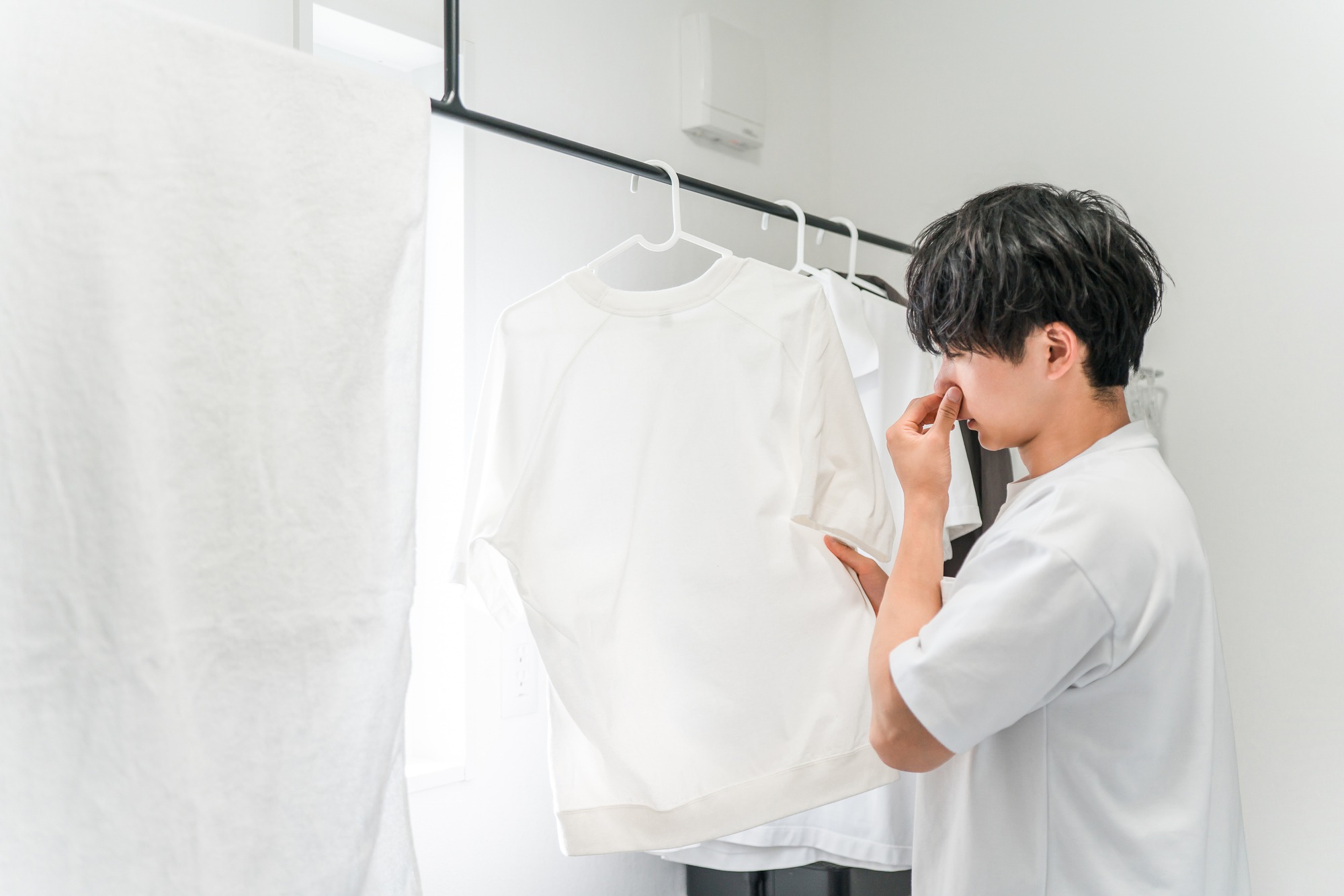 臭い匂いのついた干した服